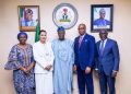 FG Inaugurates AMCON Board With Dr. Bala as Chairman
