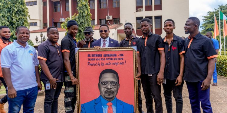 STAFF OF BIPC BREAD, WATER CELEBRATE ONE-YEAR ANNIVERSARY WITH GMD ASEMAKAHA