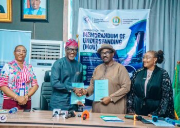 The Director-General, Nigeria Civil Aviation Authority (NCAA), Capt. Chris Najomo (right) and the Commissioner for Insurance/CEO, National Insurance Commission (NAICOM), Mr. Olusegun Ayo Omosehin, displaying the MoU both signed on Aviation Insurance at the NCAA Corporate Headquarters, Abuja, on Wednesday. With them are Mrs. Bola Odukale (Left), the Director-General and CEO, Nigerian Insurers Association (NIA), and Mrs. Mary Tufano-Eche (right), Director, Legal Services\Company Secretary. NCAA.